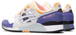 white and orange asics