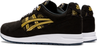 Asics black store and gold shoes